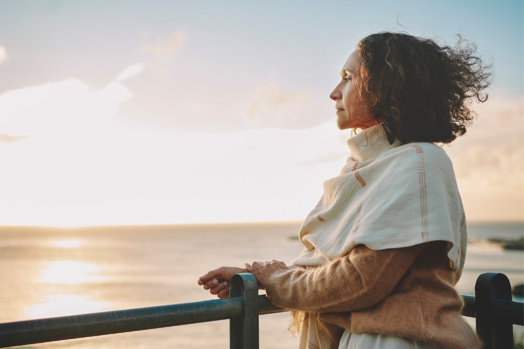 Woman watching sunset